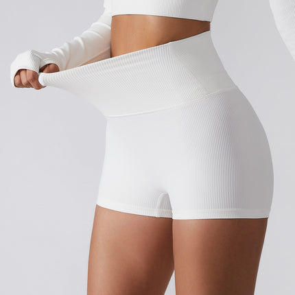 High waist lift yoga shorts in white with ribbed fabric, offering a relaxed and comfortable fit, ideal for summer and spring fitness activities.