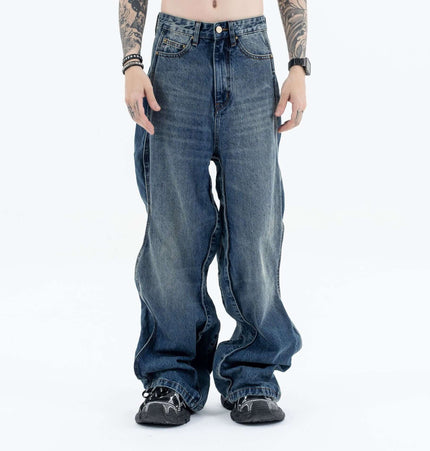 Wave Washed Distressed Jeans – Loose Fit displayed on model with relaxed street style and vintage character.