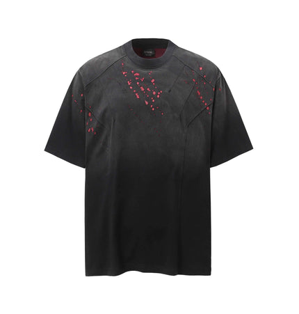 Retro Splatter Print TShirt – Loose Fit featuring a washed, faded design with creative patterns in black and red.