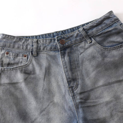 Close-up of Washed Distressed Denim Pants showcasing the waistband and pockets, perfect for casual street-style looks.