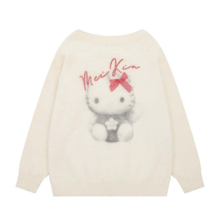 Model wearing Apricot hello kitty print round sweater by Grozavu