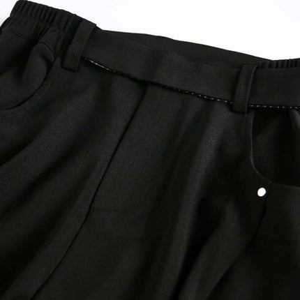Wide Leg Pleated Plaid Trousers waistband and pocket detail in black, designed for comfort and casual style.