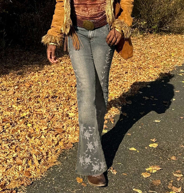 Retro Washed Slim Micro Flared Pants showcased in a stylish outdoor setting with falling leaves.