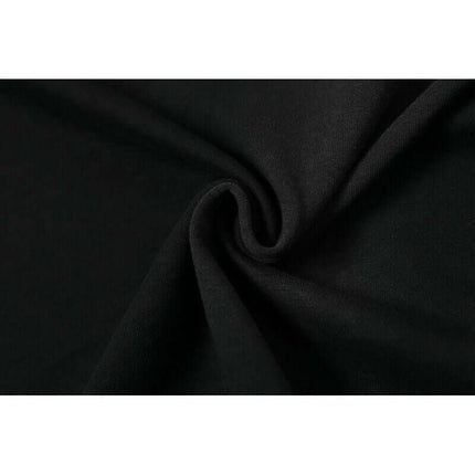 Close-up of premium soft cotton fabric featuring a relaxed texture for the Washed Spray Print T-Shirt – Loose Fit.