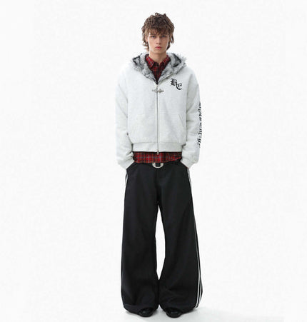 Velvet Hooded Jacket - Loose Fit worn by a model, showcasing casual style with urban flair and oversized pants.