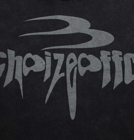 Retro Washed Letter TShirt – Loose Fit graphic design close-up with bold letter print on a dark background.