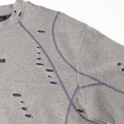 Punk Distressed Short Sleeve T-Shirt – Loose Fit with bold graphics and ripped detailing, showcasing premium streetwear style.