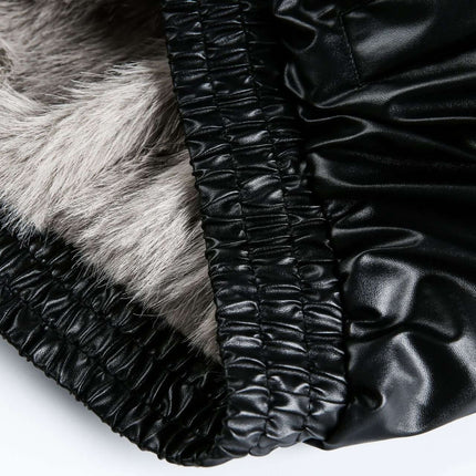 Detail of black faux leather and fur lining of the Oversized Reversible Hooded Parka.