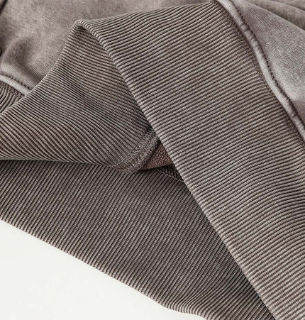 American Retro Washed Hoodie – Loose Fit close-up showcasing the soft fabric and ribbed cuffs.