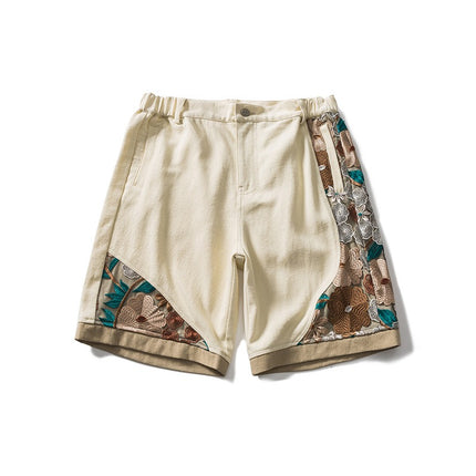 Trendy men's street style relaxed-fit cotton shorts with intricate floral embroidery, suitable for sports and casual wear.