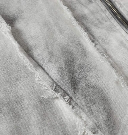 A close-up of the fabric showing the details of the Spray Paint Spliced Jacket – Casual Fit.