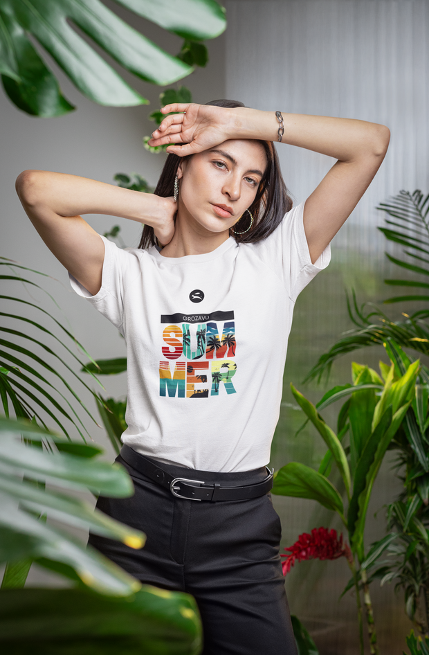 Reflections of a model in sunglasses and minimalist tee in a glass building—transparency meets clarity.