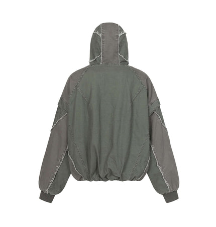 Back view of the Patchwork Distressed Hooded Jacket showcasing its washed distressed texture and raw edge design.