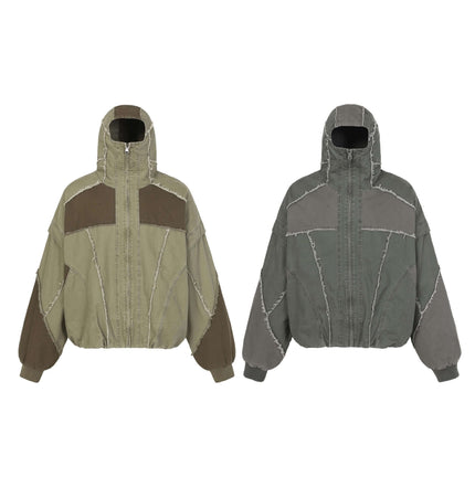 Patchwork Distressed Hooded Jacket showcasing a two-tone design with raw edge detail and oversized silhouette.
