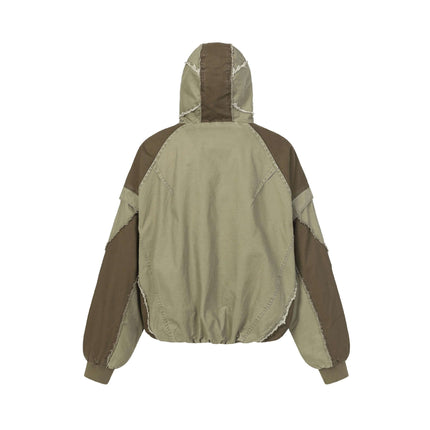 Back view of the Patchwork Distressed Hooded Jacket showcasing its raw edge and color-block design.