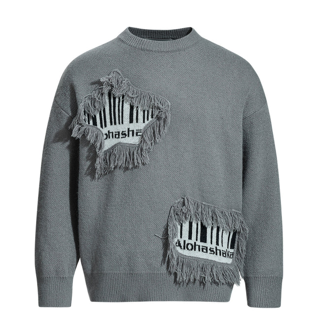 Fringe Patchwork Knit Sweater – Loose Fit with raw-edge patchwork and fringe accents in gray.