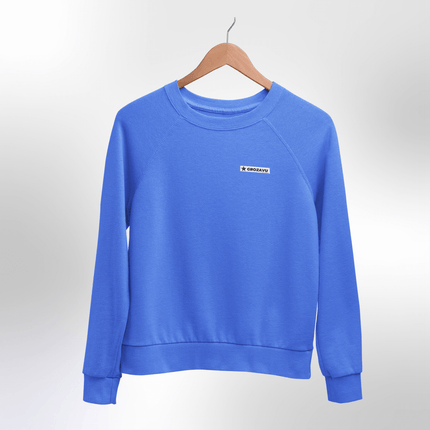 A trendy fuzzy sweatshirt with bold urban prints, combining streetwear flair and maximum comfort for all-day wear