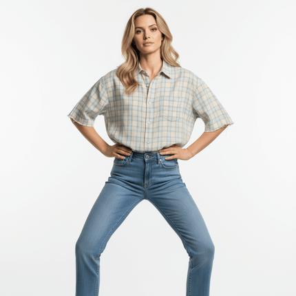 Frayed Hem Checkered Shirt - Loose Fit model wearing a casual blue checkered shirt with jeans.