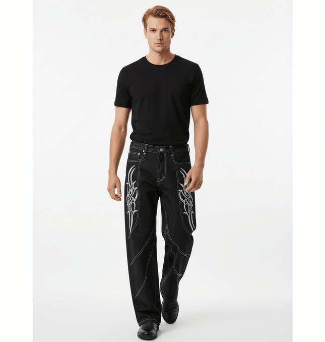 Man wearing Street Vibe Straight Jeans – Loose Fit with a black t-shirt and stylish footwear.
