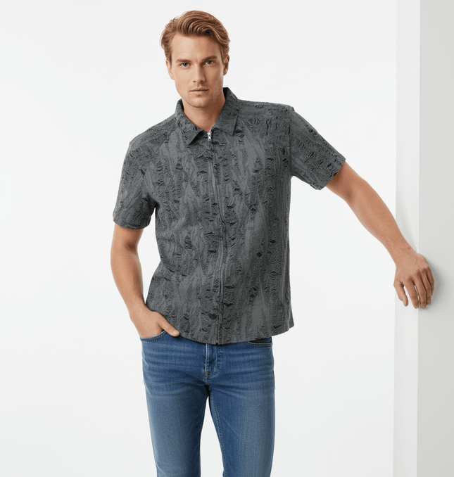 Distressed Short Sleeve Shirt - Loose Fit worn by a man, showcasing modern streetwear style and a comfortable look.