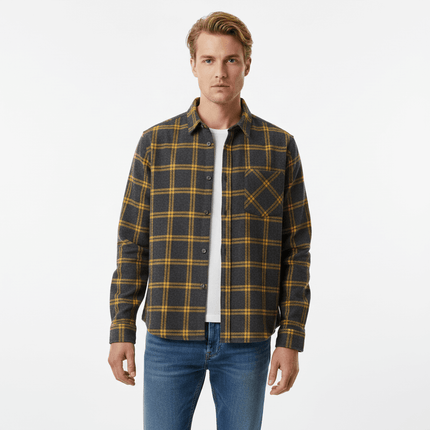 Casual Plaid Shirt – Relaxed Fit worn by a man, featuring a plaid pattern in gray and yellow, perfect for casual styling.