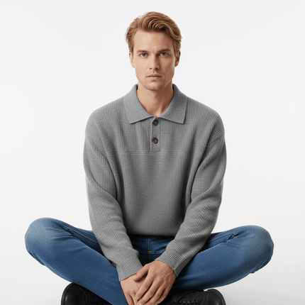 Casual Ribbed Half-Zip Sweater worn by a man in grey, sitting cross-legged in a modern casual pose.