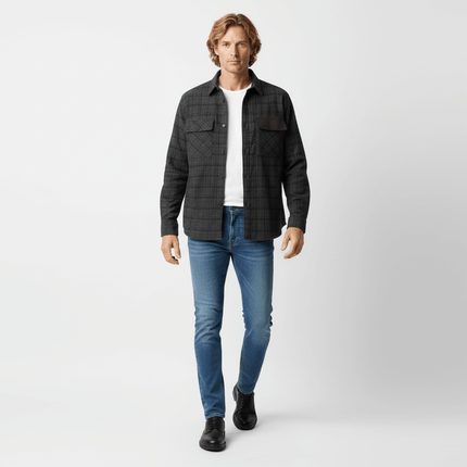 Color Block Plaid Shirt – Loose Fit worn by a model, showcasing a dark green plaid pattern and a classic flip collar.