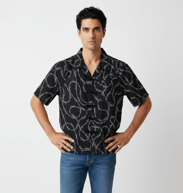 Striped Short Sleeve Shirt - Loose Fit on model with unique black and white pattern for casual style.