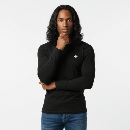 Long Sleeve Printed TShirt - Slim Fit displayed by a model with long hair in a minimalist studio setting.