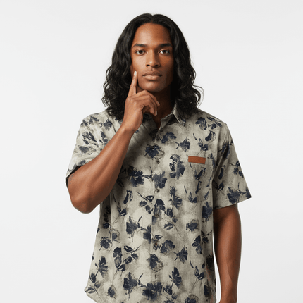 Floral Print Short Sleeve Shirt – Loose Fit worn by a model with long hair, showcasing a stylish floral pattern.