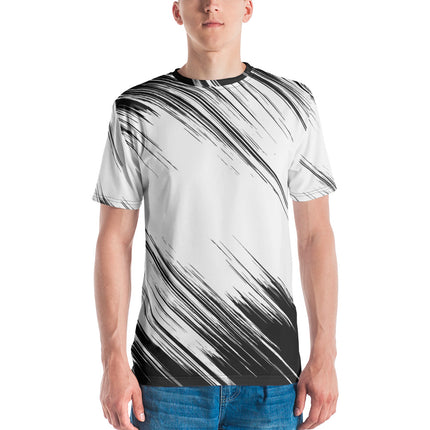 Man wearing Grozavu’s New 100% cotton t-shirt with modern black and white abstract design, paired with blue jeans.