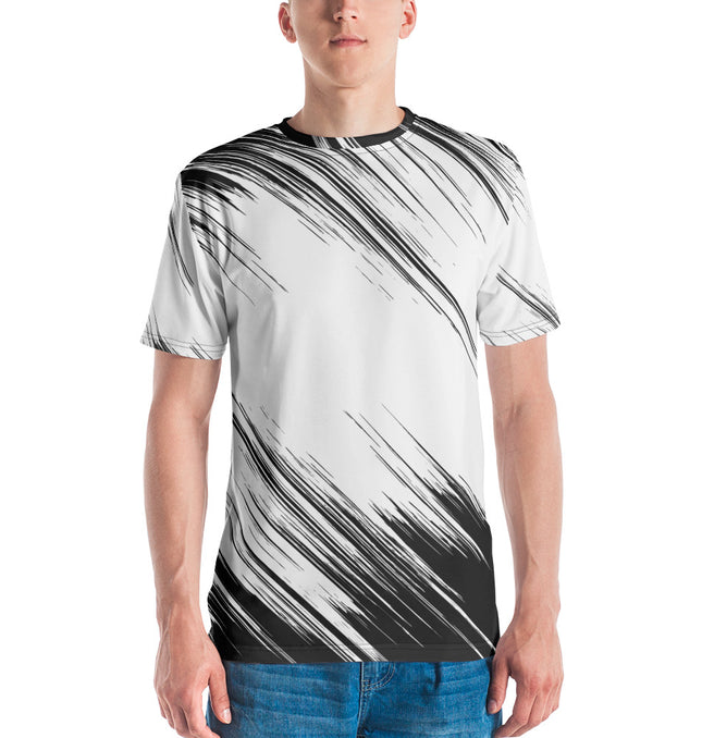 Man wearing Grozavu’s New 100% cotton t-shirt with modern black and white abstract design, paired with blue jeans.