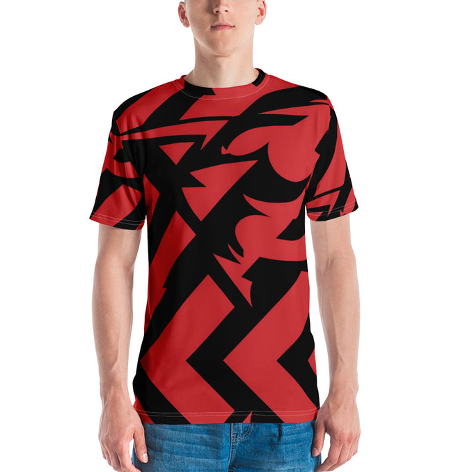 Man wearing a stylish red and black graphic cotton t-shirt standing against a plain background