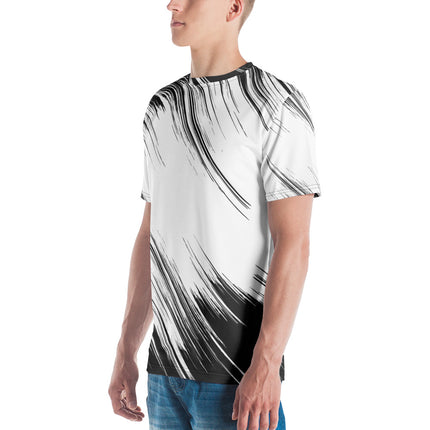 Side view of a man wearing a black and white abstract patterned Grozavu organic cotton t-shirt with a relaxed fit.