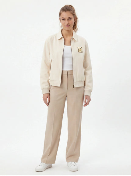 Close-up of Apricot cropped tailored jacket fabric