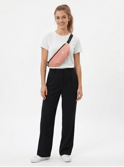 Model wearing utility crossbody bag by Grozavu