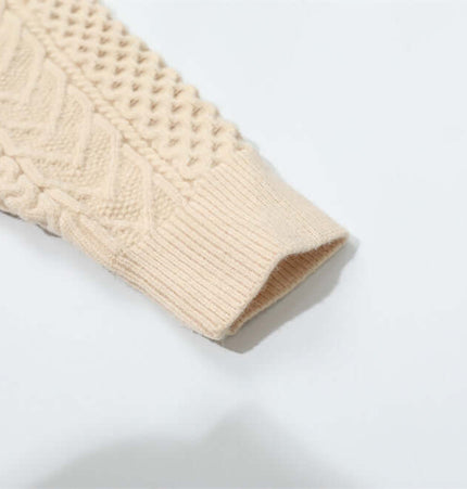 Letter Beaded Knit Sweater – Loose Fit close-up of textured sleeve detail in light color.