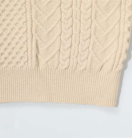 Letter Beaded Knit Sweater – Loose Fit close-up of the textured knit and ribbed hem in beige color.