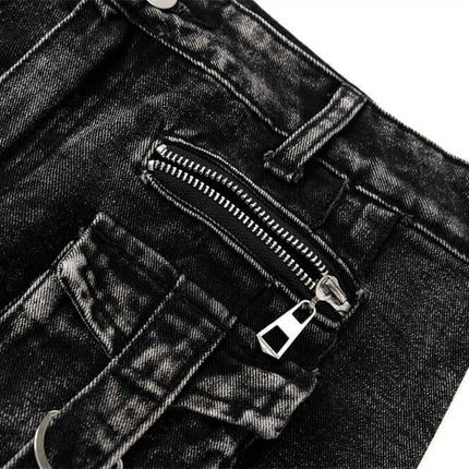 Close-up image of Belted Distressed Cargo Jeans featuring a zippered pocket and rugged black denim texture.