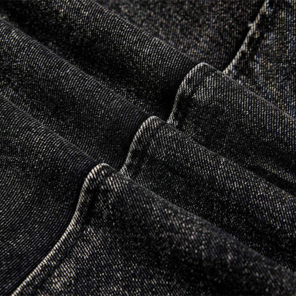 Close-up of heavyweight fabric for Belted Distressed Cargo Jeans, showcasing the unique texture and style details.