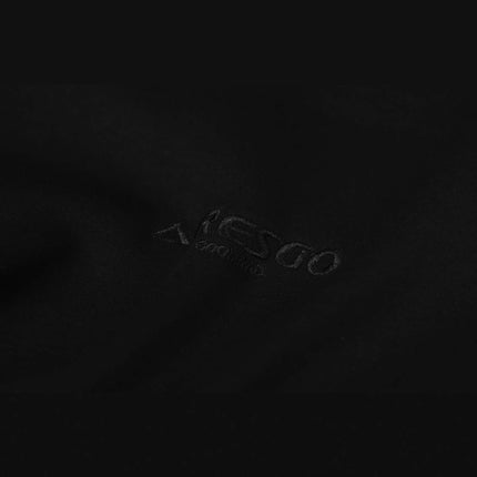 Close-up of the Patchwork Embroidered Hoodie – Loose Fit showcasing its stylish black fabric texture.