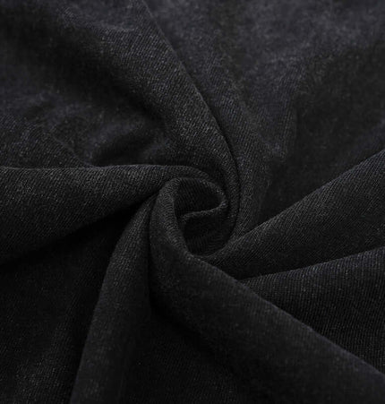 Soft black fabric swirl, highlighting the material for the Oversized Printed Sleeveless Tank Top.