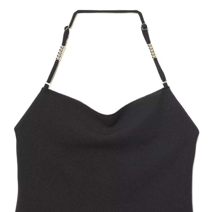 Stylish black halter top with unique shoulder strap details, perfect for summer outfits.