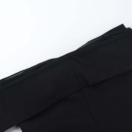Close-up of the Slim Fit One-Shoulder Bow Top in black showcasing its elegant design and soft fabric.