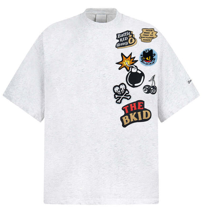 Cartoon Badge Cotton TShirt – Loose Fit featuring playful patches and a trendy oversized design.