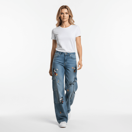 Woman wearing Casual Embroidered Denim Cropped Pants with embroidery details and white t-shirt.