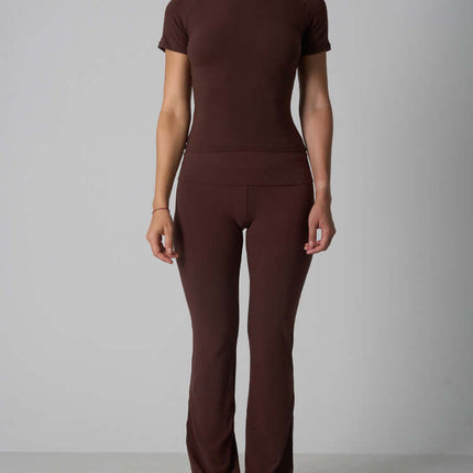 A model wearing a Casual Fit Cotton Jersey Yoga Set in brown, showcasing the stylish and comfortable design.