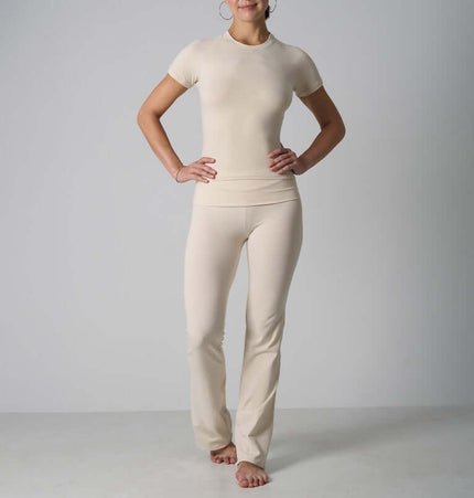 Casual Fit Cotton Jersey Yoga Set featuring a short sleeve crop top and high-waist long flare pants in soft brushed cotton.