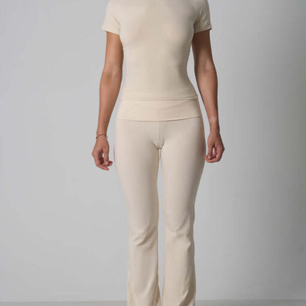 Casual Fit Cotton Jersey Yoga Set featuring a short sleeve crop top and high-waist long flare pants for stylish comfort.