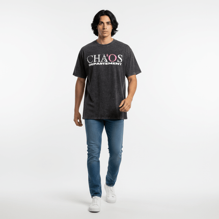 Cross Print Vintage TShirt – Loose Fit model wearing a casual gray tee with CHaOS DEPARTEMENT print and blue jeans.